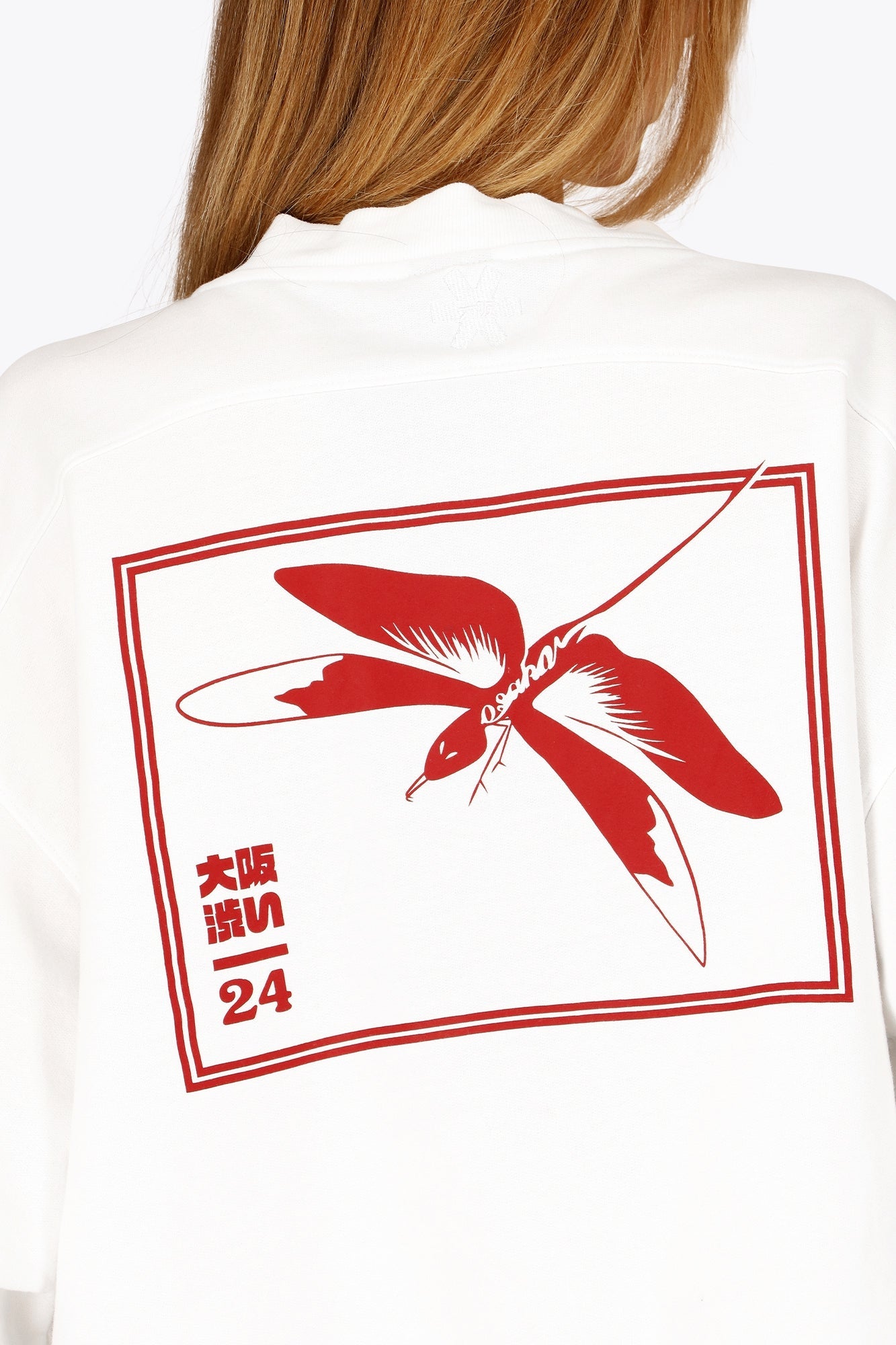 Osaka women v-neck cropped sweater white with logo in red. Back detail logo view
