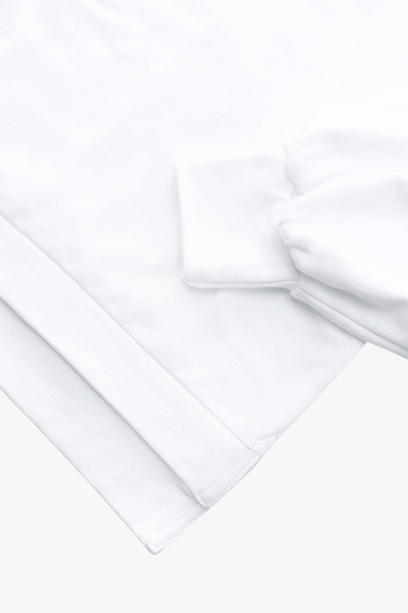 Osaka women v-neck cropped sweater white with logo in red. Front flatlay sleeve view