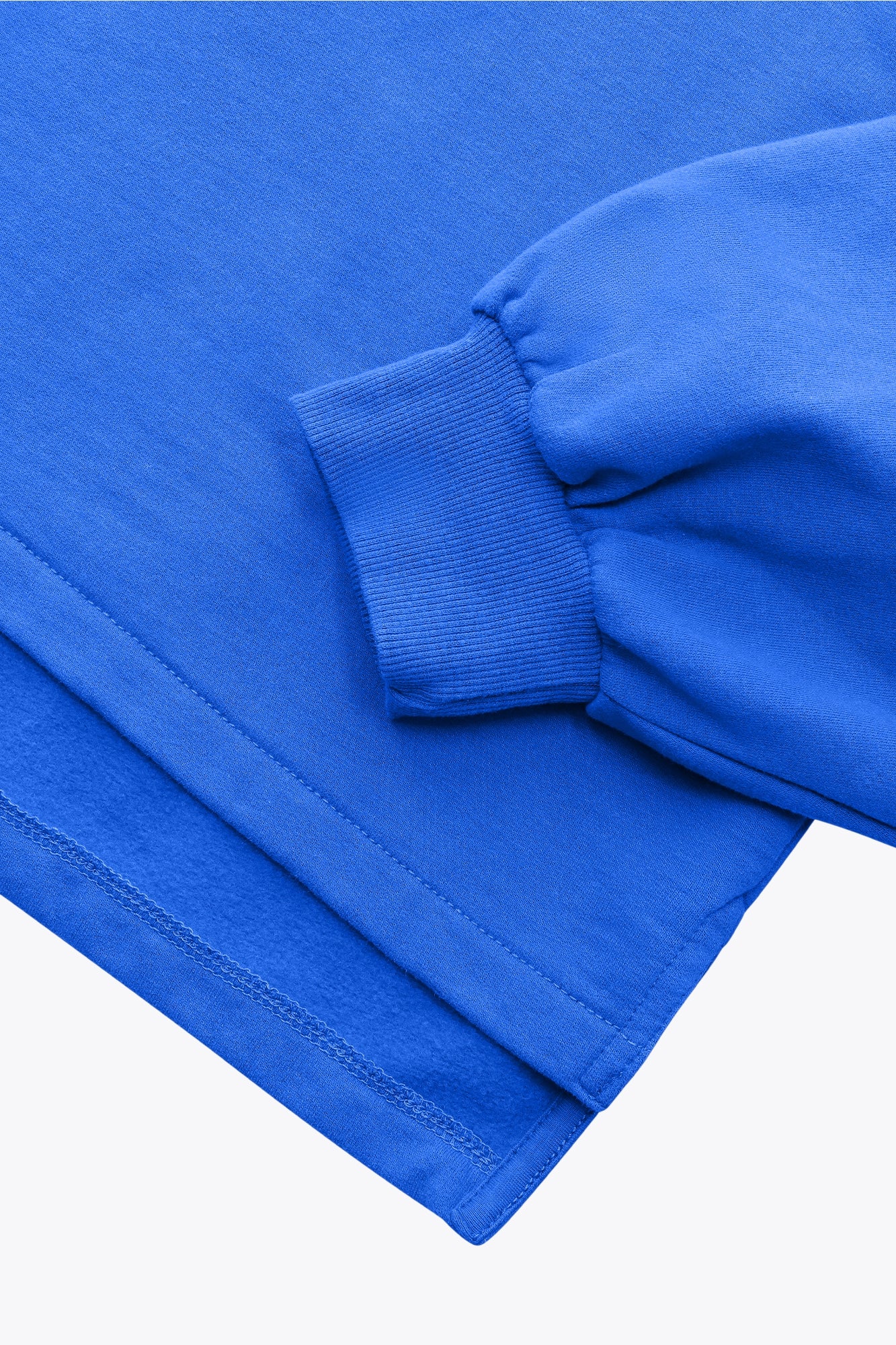 Osaka women cropped hoodie inprincess blue with college logo in white. Front flatlay sleeve detail view