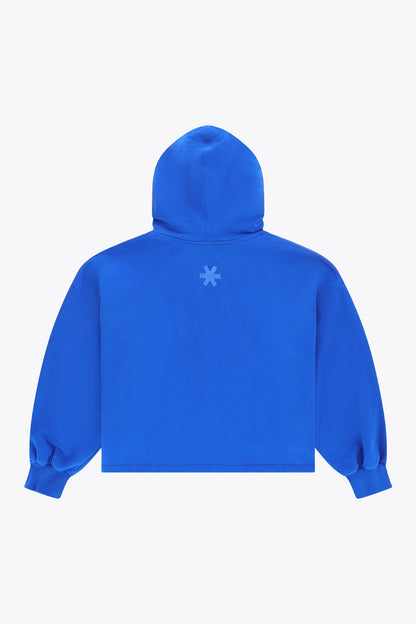 Osaka women cropped hoodie inprincess blue with college logo in white. Back flatlay view