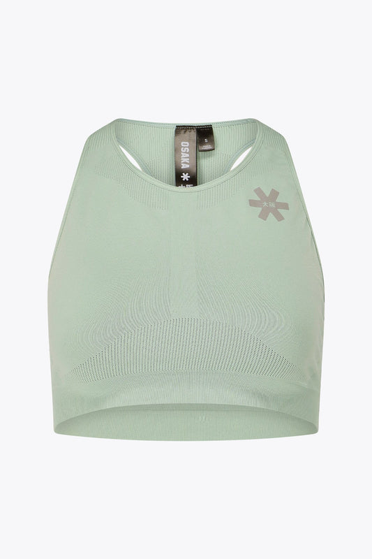 Osaka women tech sports bra in jadeite with logo in grey. Front flatlay view