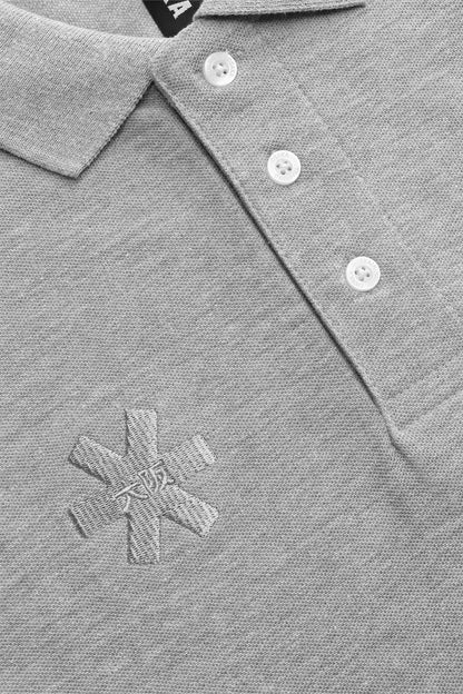 Osaka unisex basic polo in grey with grey logo. Front detail logo view