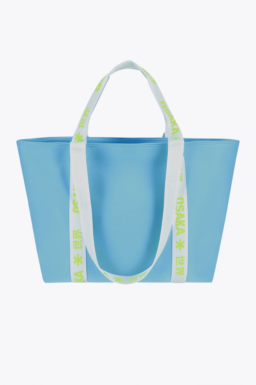 Osaka neoprene Tote bag in light blue with logo in white. Back view