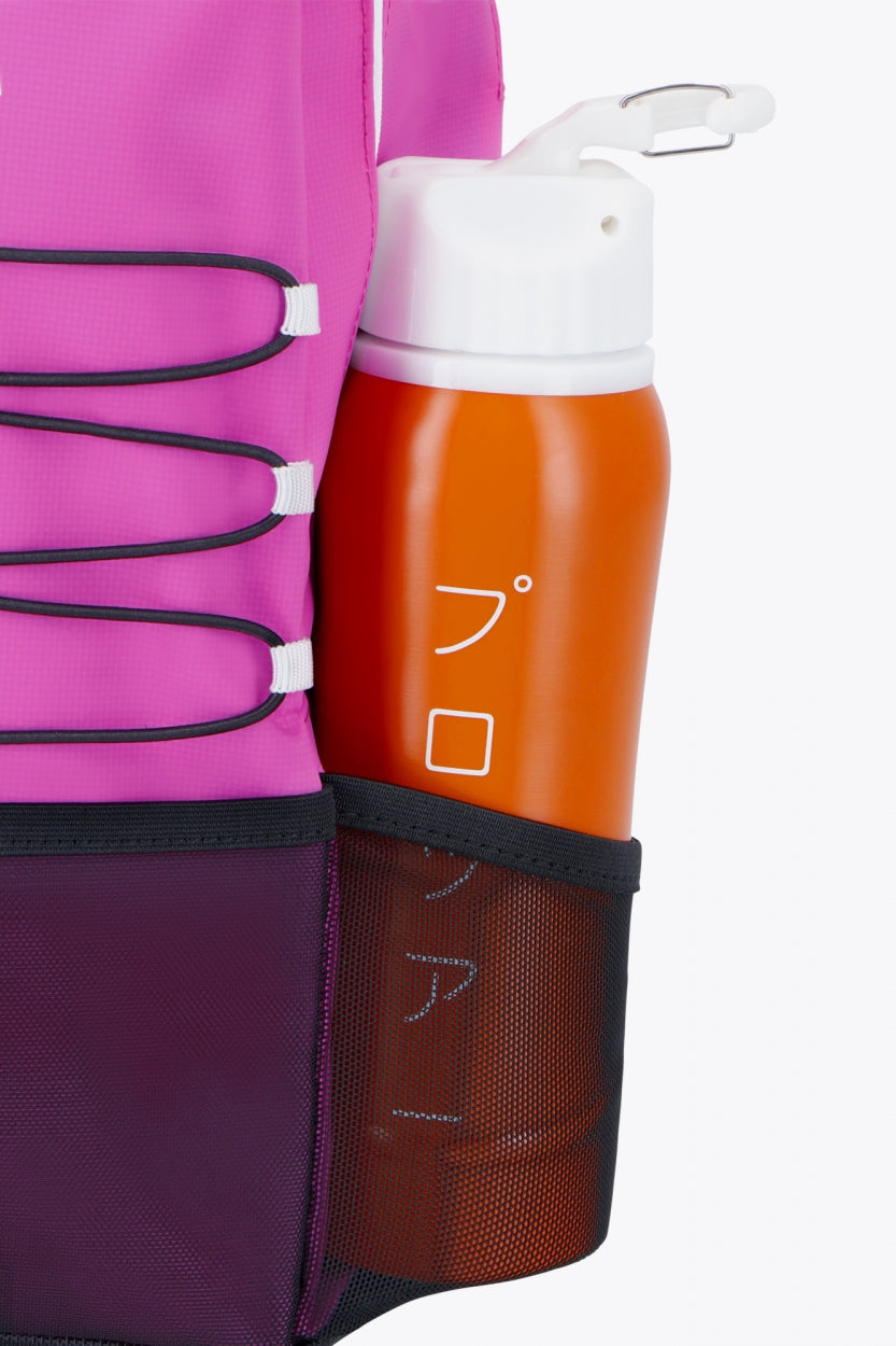 Osaka pro tour compact backpack in pink with logo in white. Detail water bottle  holderview