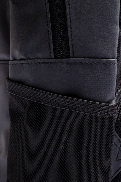 Osaka x Nexus backpack medium in black with white Osaka and Nexus logo on it. Detail water bottle holder view