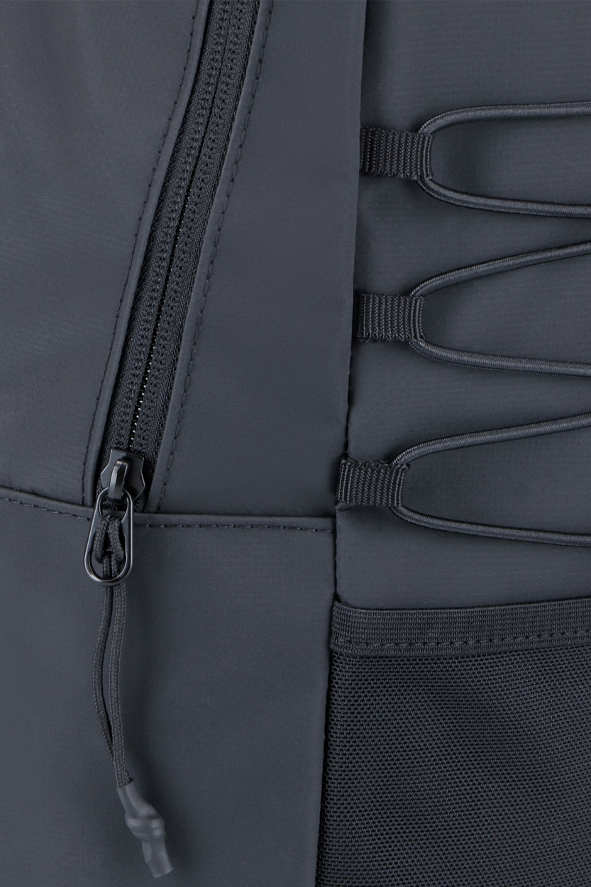 Osaka pro tour backpack compact in black with logo in green. Detail zip view