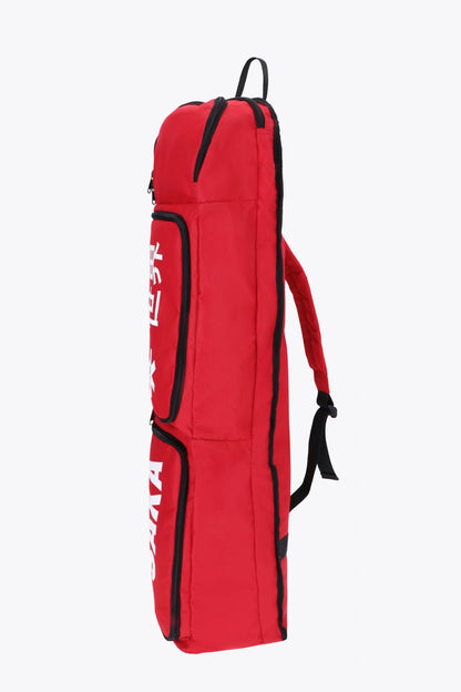 Osaka sports stickbag medium in red with logo in white. Side view