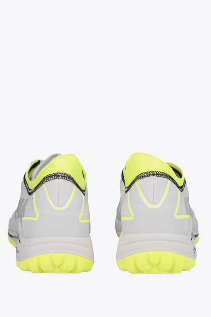 Osaka footwear Ido Mk1 in white and yellow with logo in grey. Back view