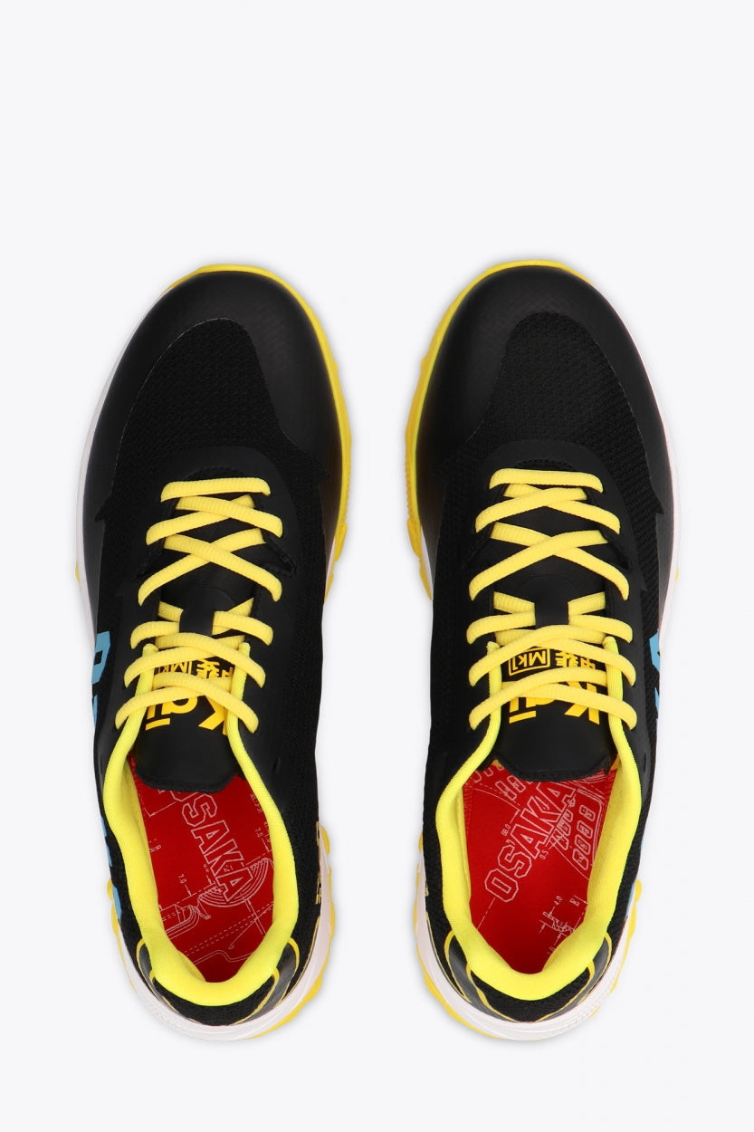 Osaka footwear Kai Mk1 in black and yellow with logo in blue. From above view