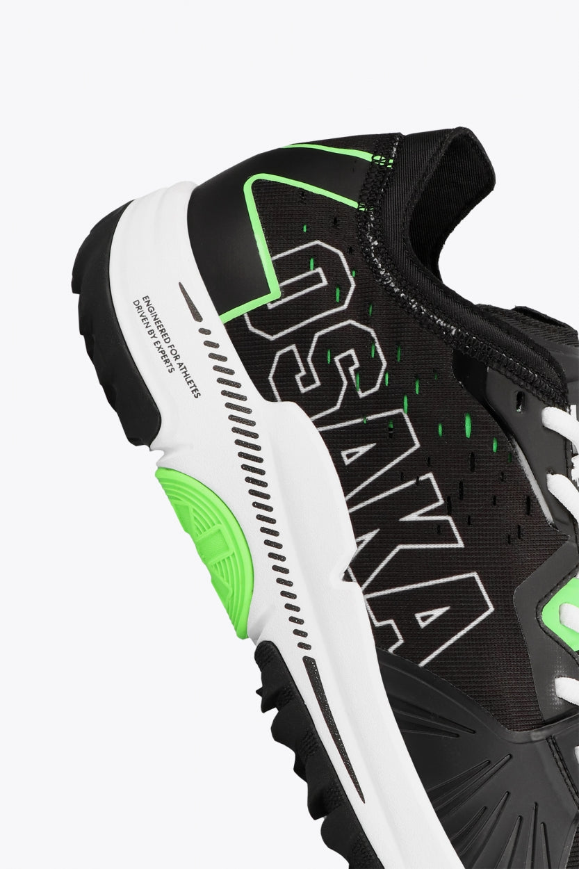 Osaka footwear Ido Mk1 in black and green with logo in black. Detail logo view