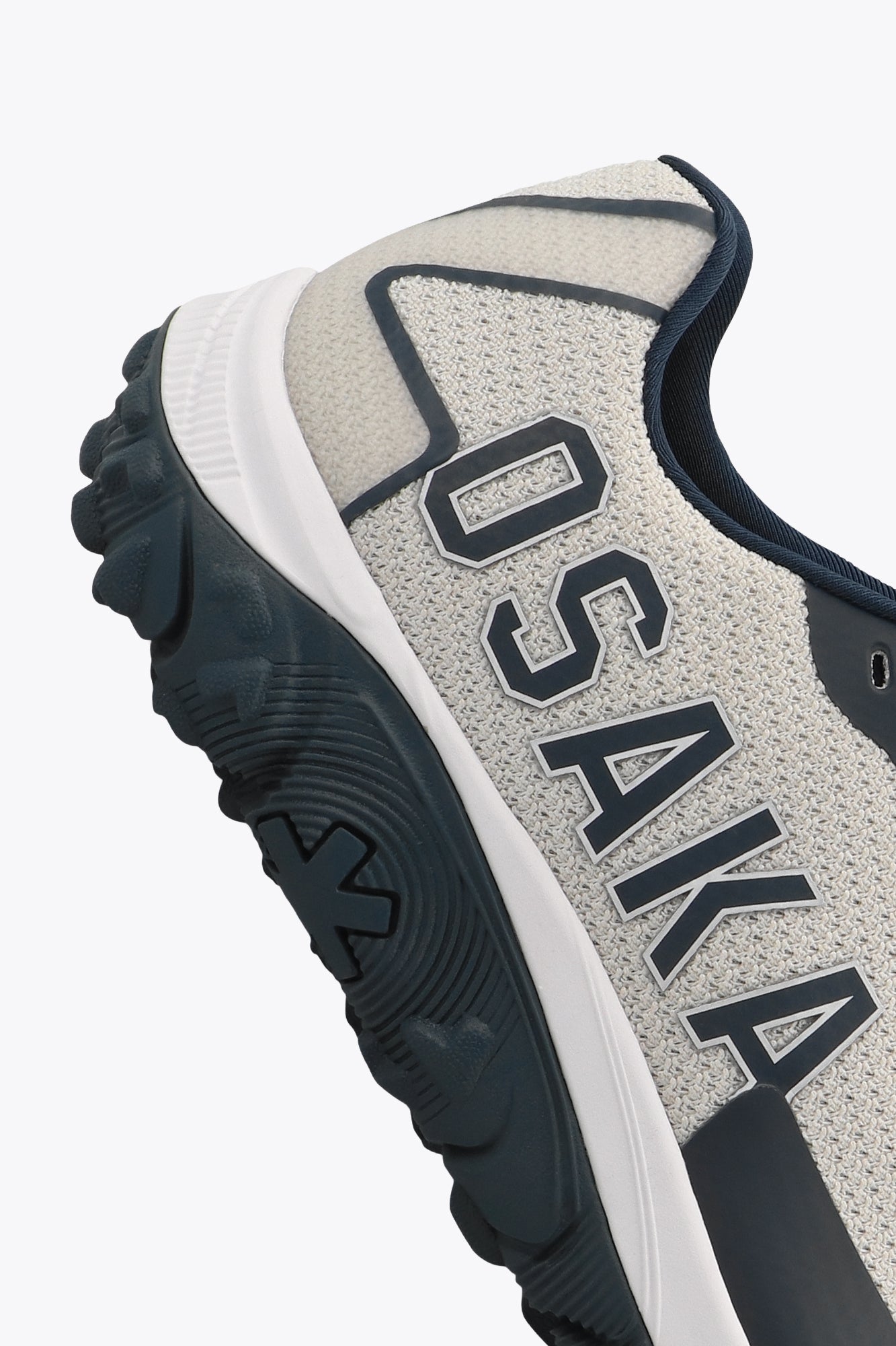 Osaka footwear Kai Mk1 in grey navy with logo in navy. Detail logo view