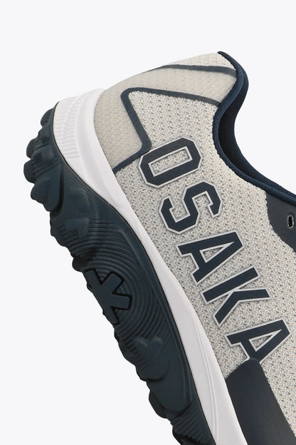 Osaka footwear Kai Mk1 in grey navy with logo in navy. Detail logo view