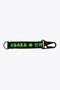 Osaka keychain in black with logo in green