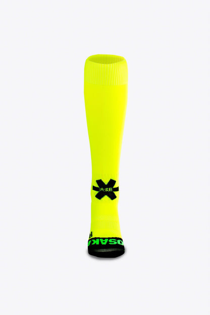 Osaka Field Hockey Socks in yellow with Osaka logo in green. Front view