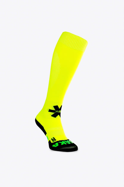 Osaka Field Hockey Socks in yellow with Osaka logo in green. Side view