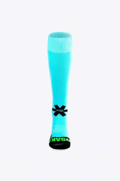 Osaka Field Hockey Socks in sky blue with Osaka logo in green. Front view