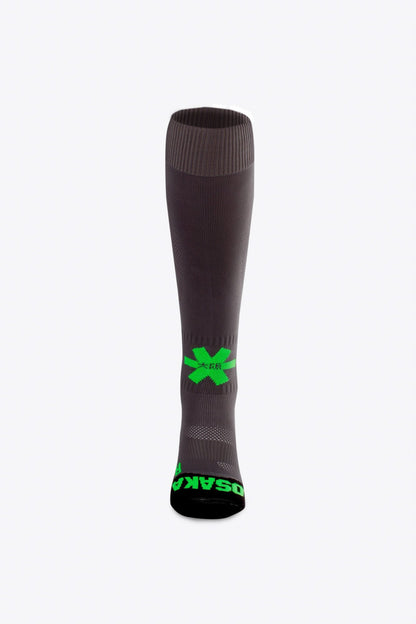 Osaka Field Hockey Socks in grey with Osaka logo in green. Front view