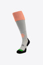 Osaka Field Hockey Socks grey and pink with Osaka logo in green. Front view 