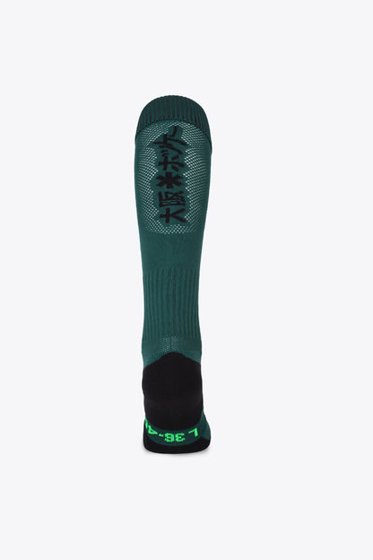 Osaka Field Hockey Socks forest with Osaka logo in green. Back view 