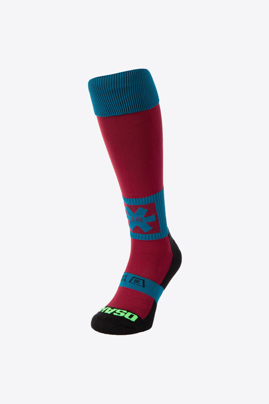 Osaka Field Hockey Socks in raisin navy mix with Osaka logo in green. Front view