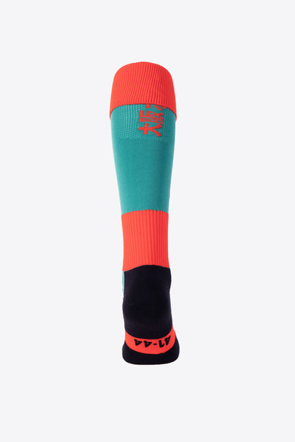 Osaka Field Hockey Socks in Jade fire mix with Osaka logo in green. Back view