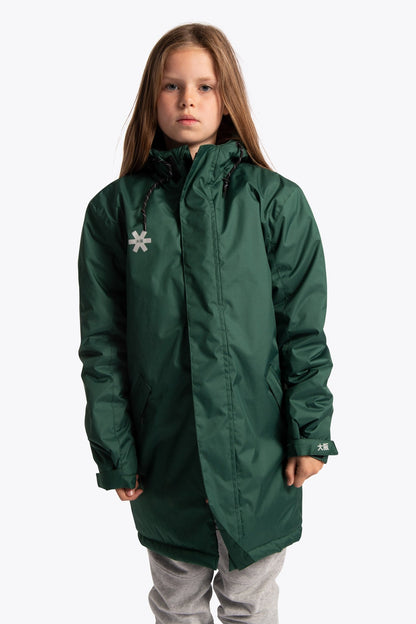 Girl wearing the Osaka Kids Stadium Jacket in Dark Green. Front view