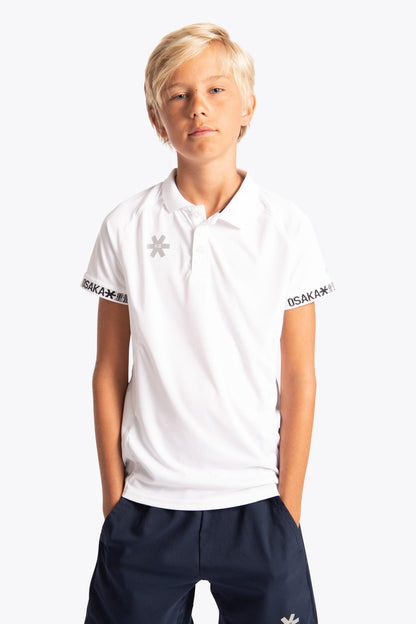 Boy wearing the Osaka Kids Polo Jersey in White. Front view
