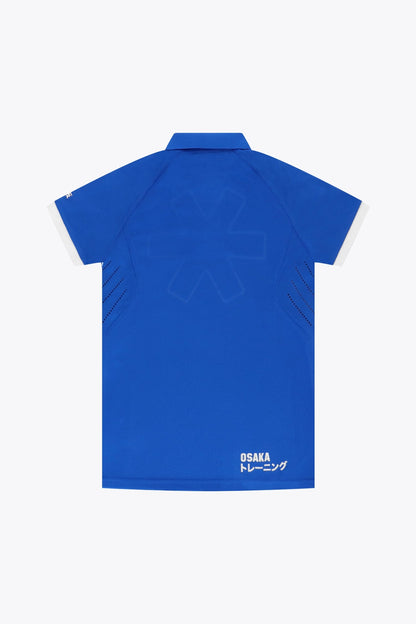 Osaka Kids Polo Jersey in Royal blue. Back flatlay view